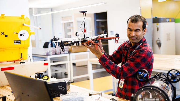 Scientist holds drone